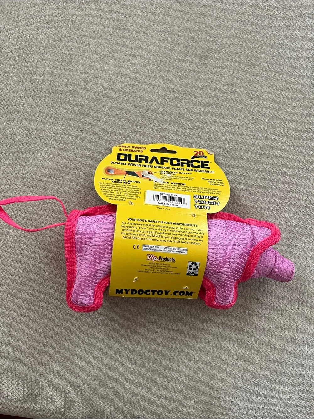 Durable Pink Dog Tug Toy by DuraForce Tuffy - Reinforced Plush